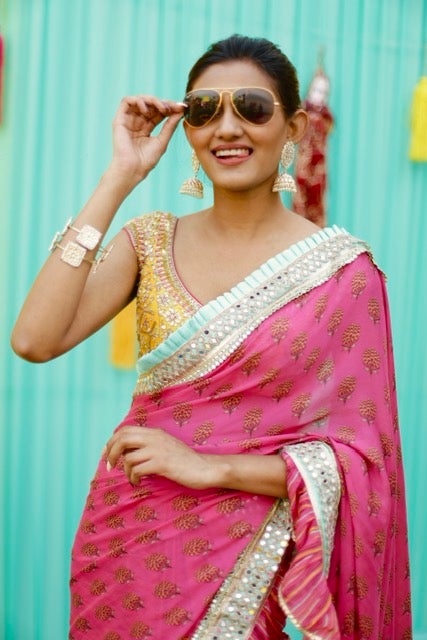 Shreya Shankar in Marigold Buti Ruffle Saree