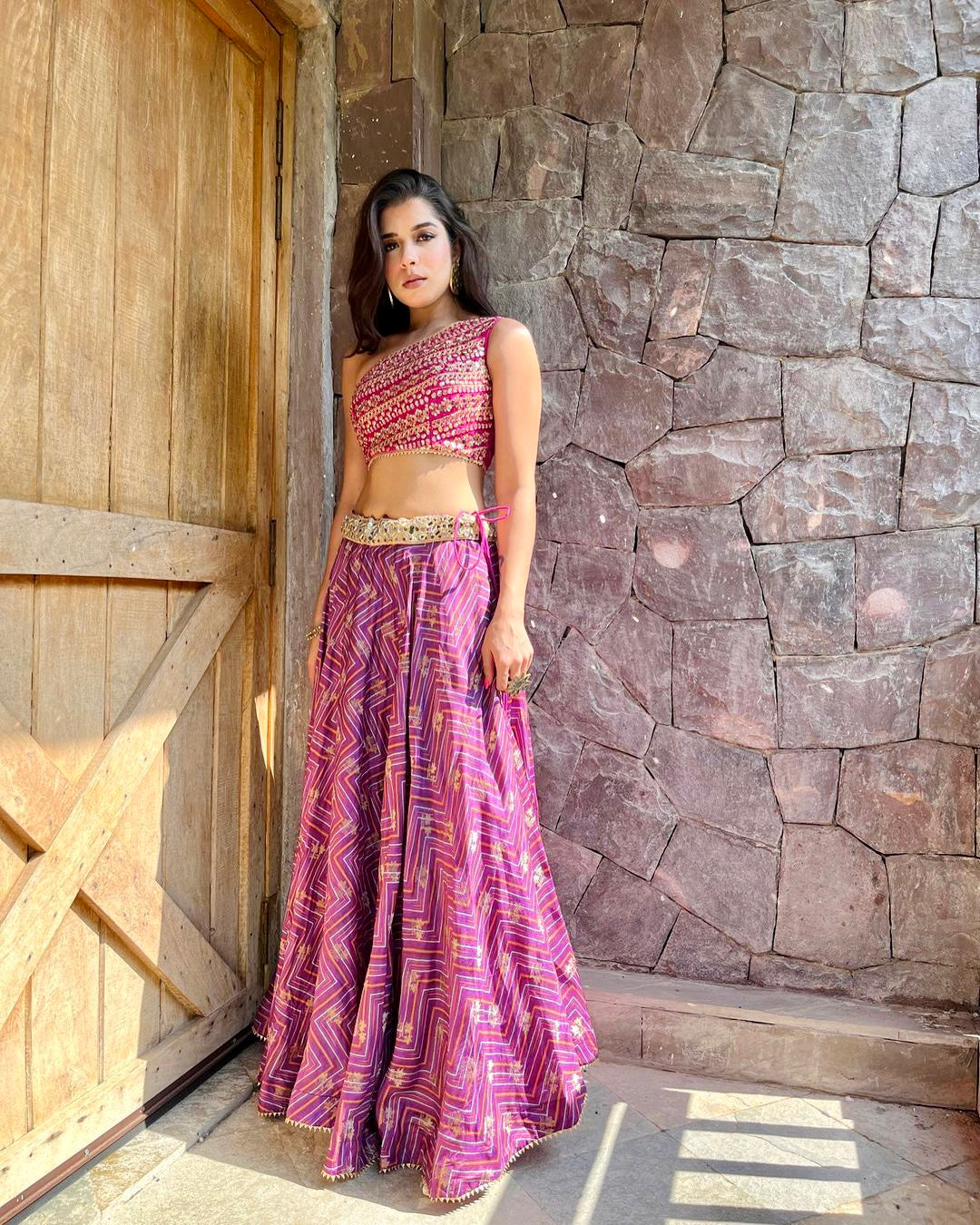 Sukhmani Gambhir in Marigold Zig-zag One Shoulder Skirt Set