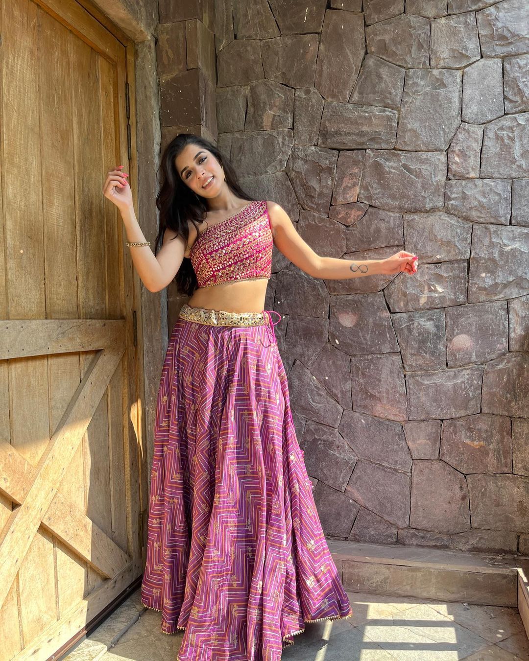 Sukhmani Gambhir in Marigold Zig-zag One Shoulder Skirt Set